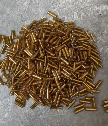 Стеклярус  Preciosa 17070, 6  мм., тёмное золото